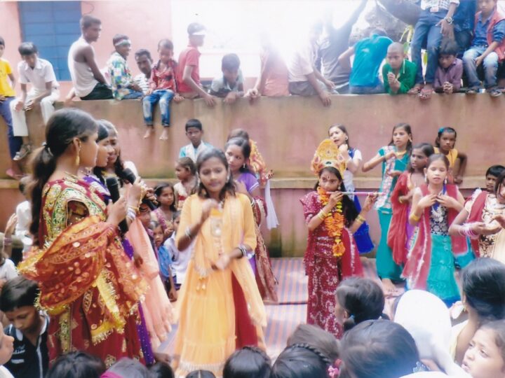 Girls performing a cultural dance, from the MESKP archive