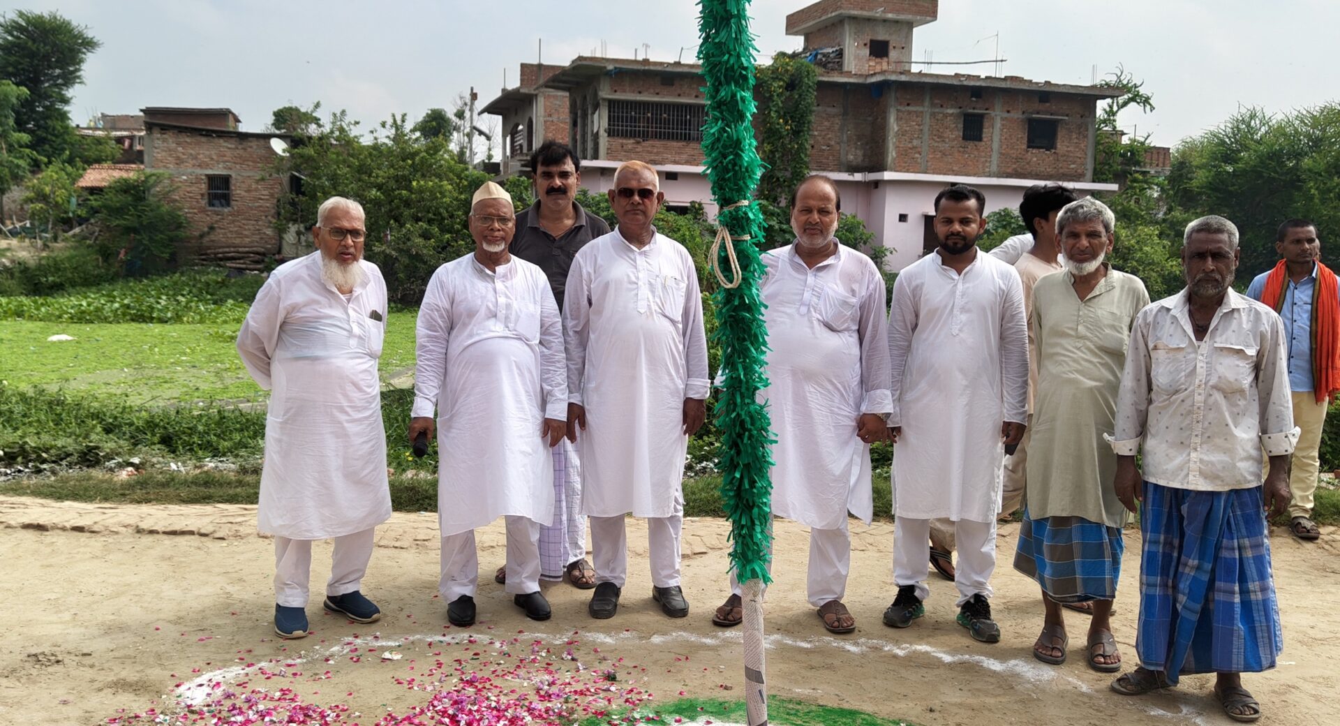 Guests and staff at the flag hoisting on Independence Day 2026, Kathalia campus