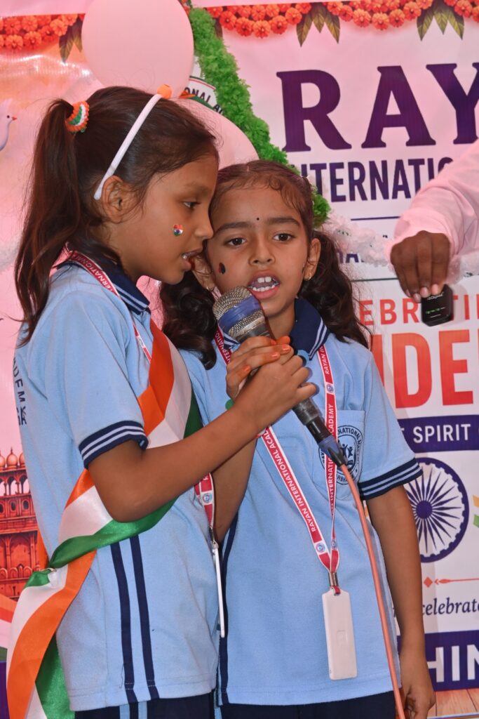 Independence Day 2026 at the Kathalia campus 7 Two girls singing on stage on Independence Day
