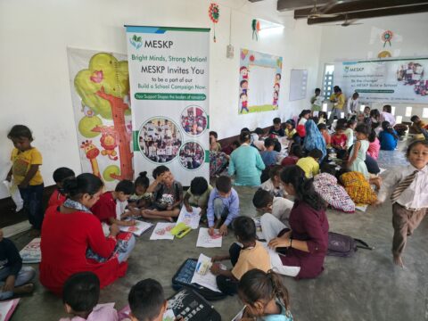 Children drawing at the Build a School campaign day, Kathalia campus
