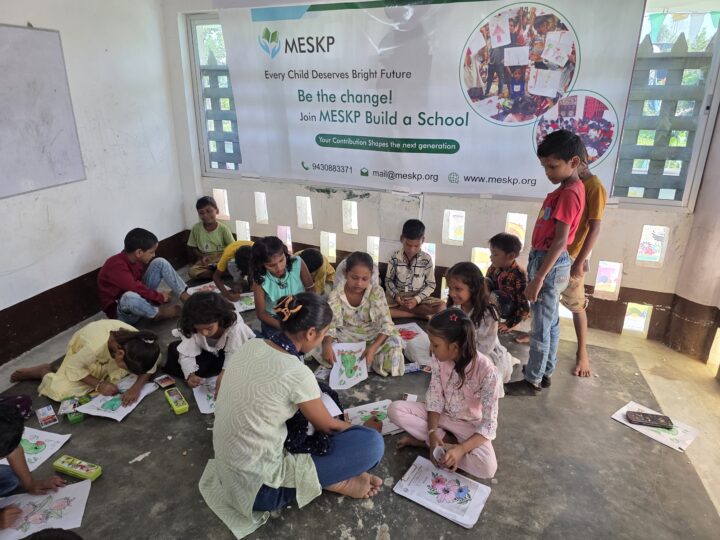 Children and volunteers on drawing day, wide view
