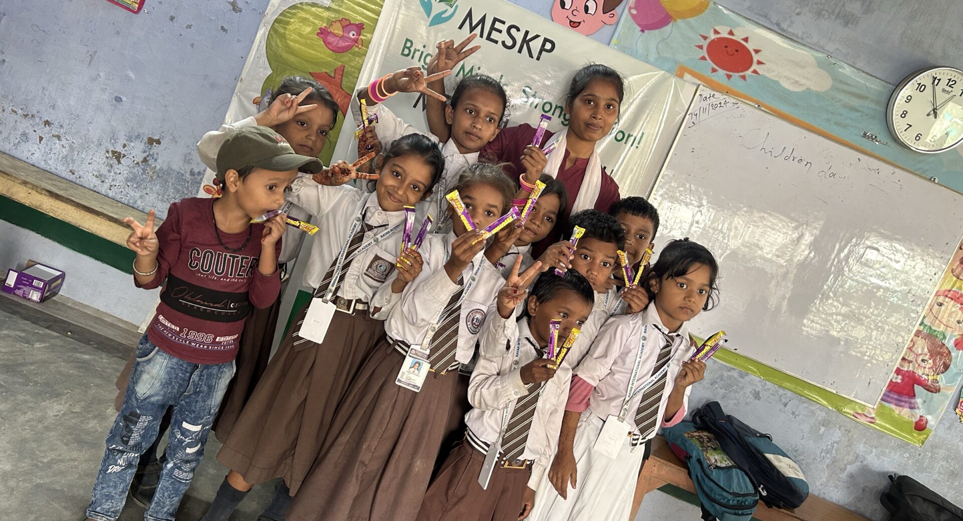 Girls in uniform celebrating prize day