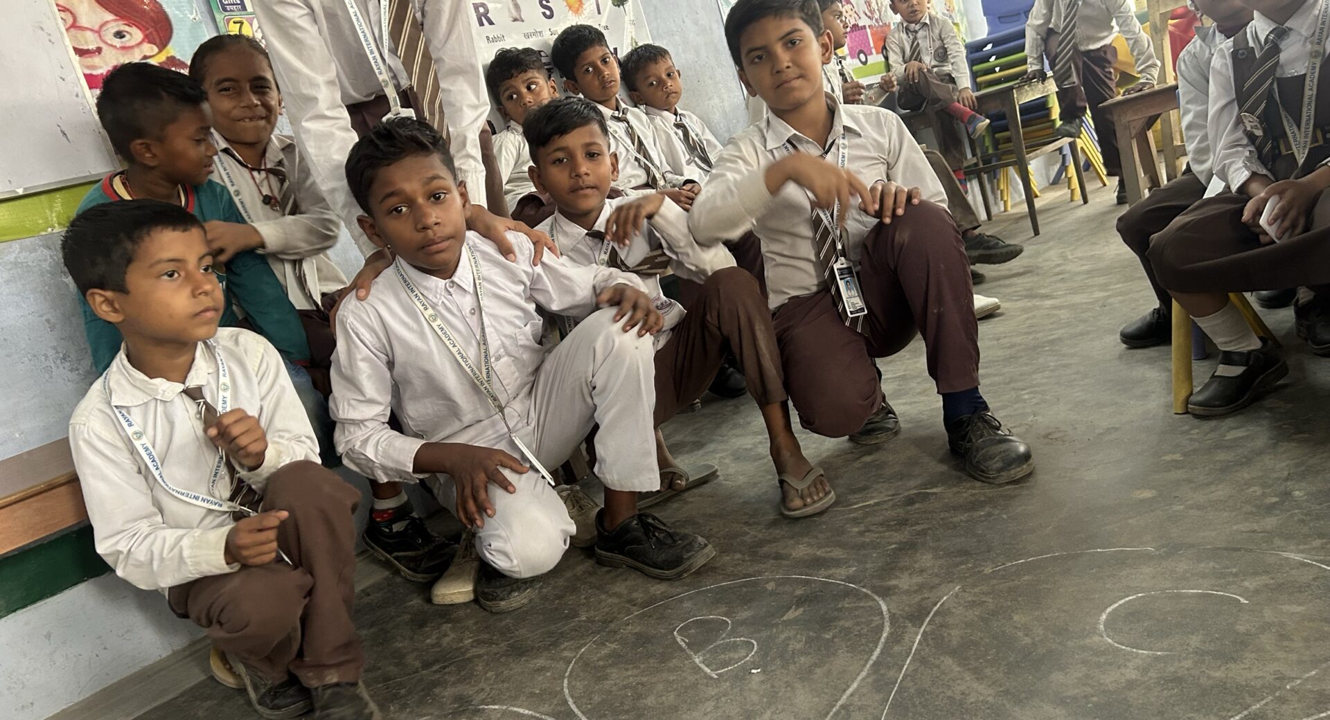 Students sitting in a row in class