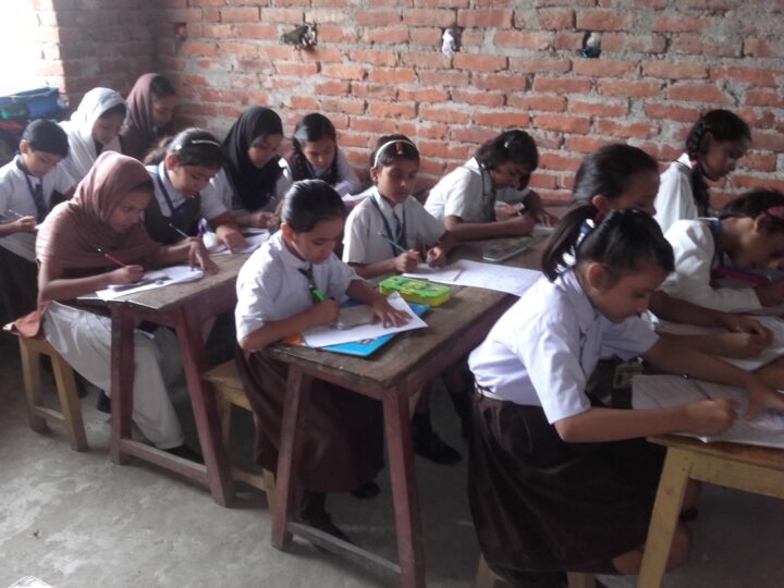 Students at their desks during an exam