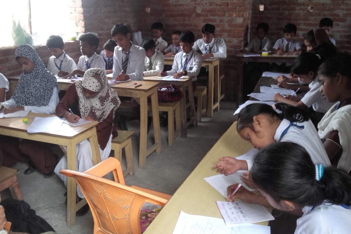 Students writing an exam in one of our early classrooms