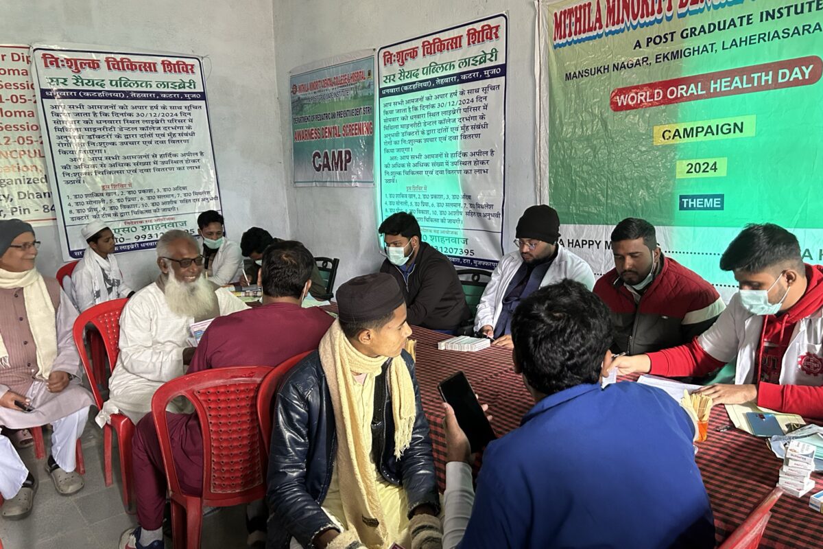Health camp volunteers registering patients