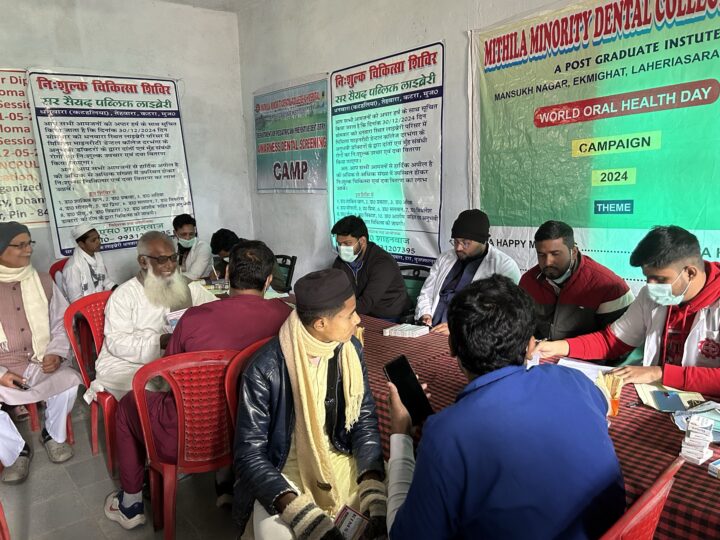 Health camp volunteers registering patients