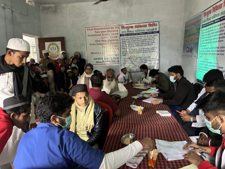 Doctors and villagers at the free dental screening camp