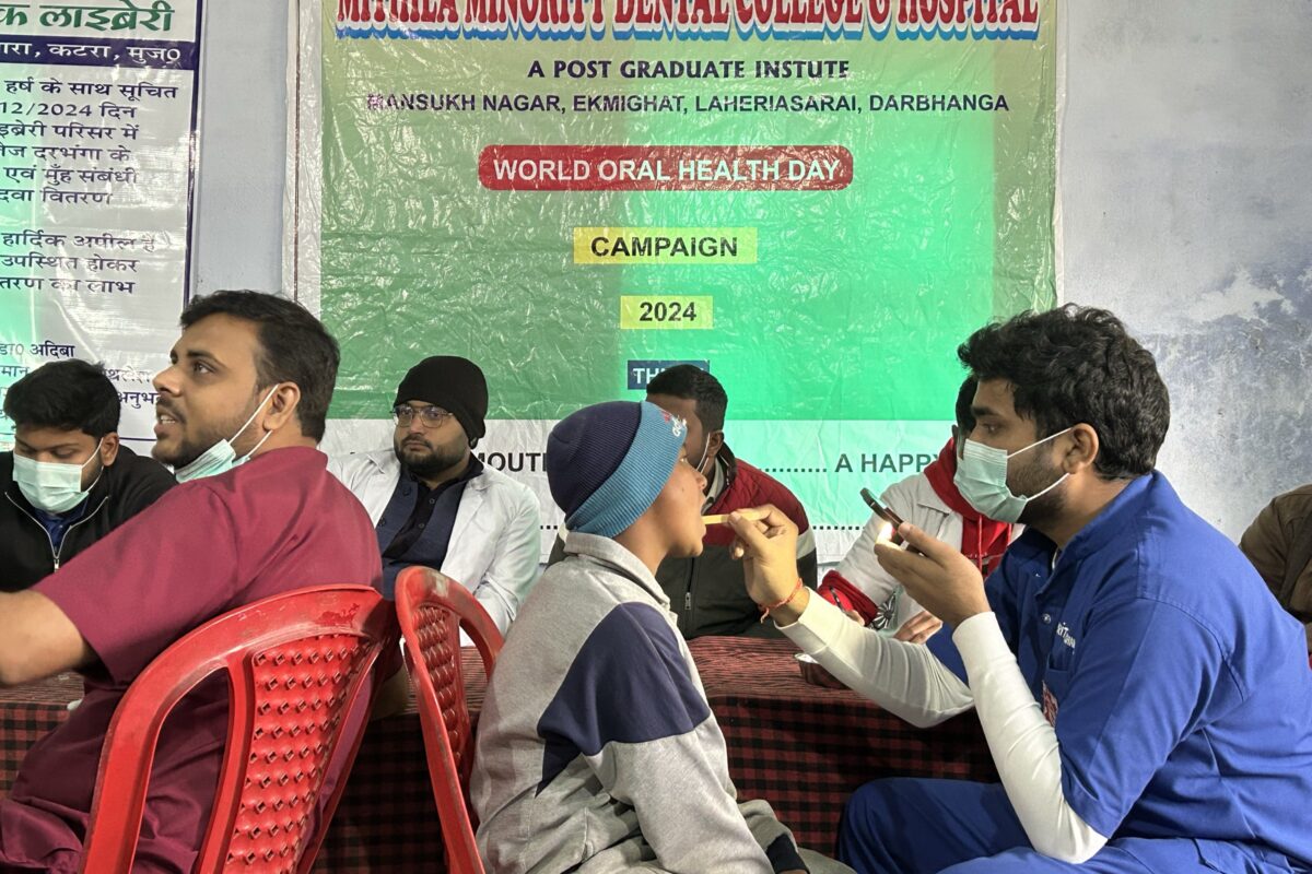 Dentist examining a patient at the free dental screening camp, Darbhanga, December 2024