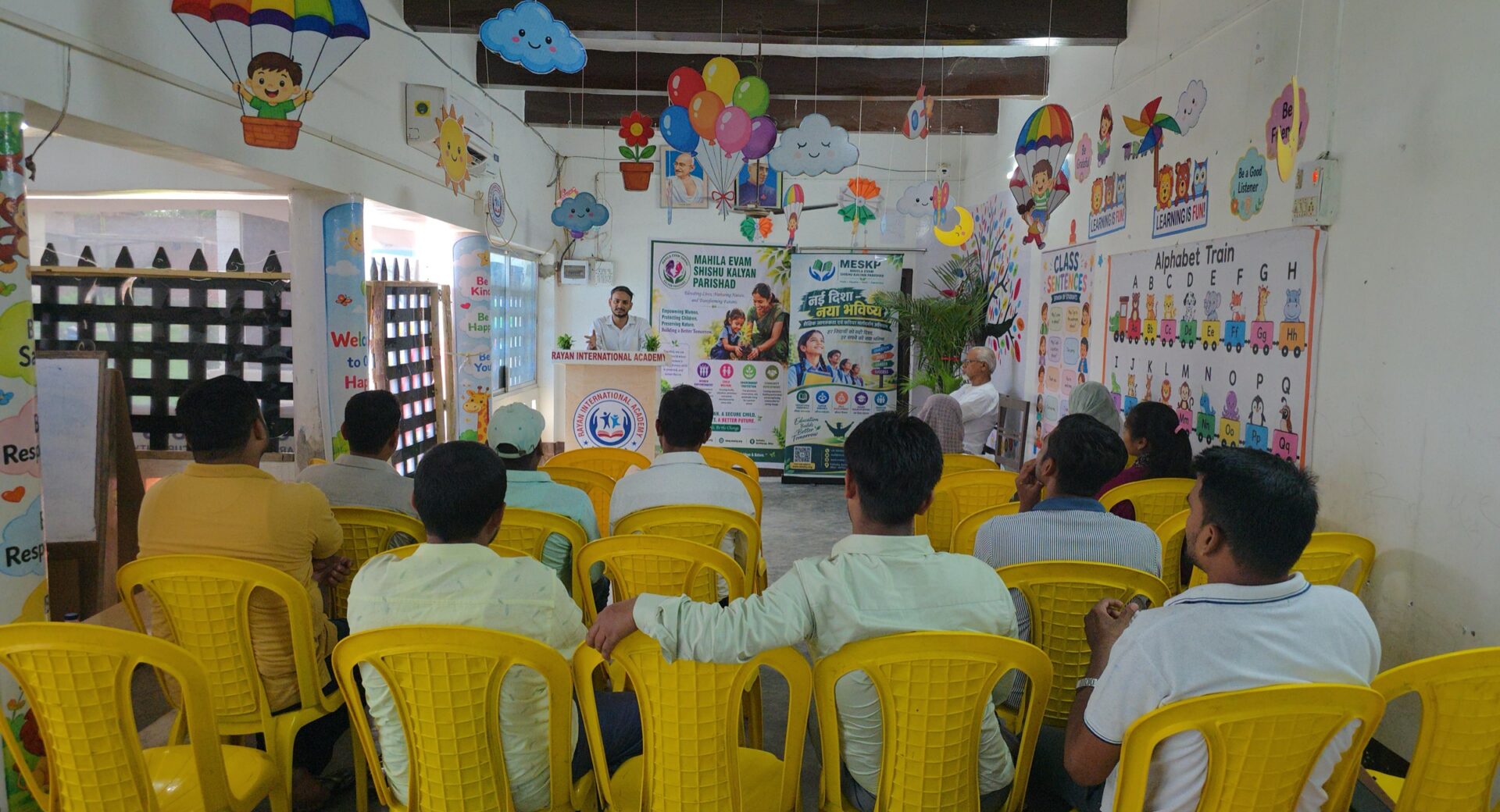 Students seated for a Nai Disha session in a decorated hall