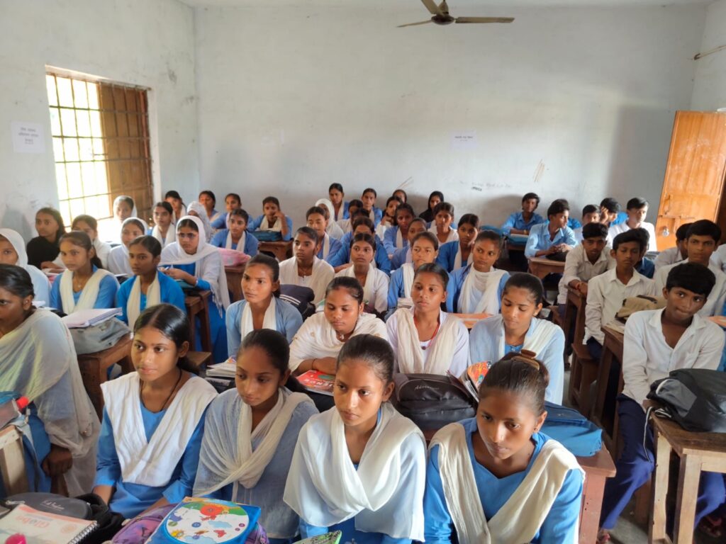 A full classroom of students at a Nai Disha session