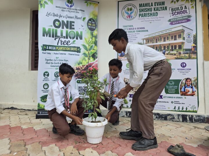 Gift a Tree 2 Students potting saplings in front of the One Million Trees banner