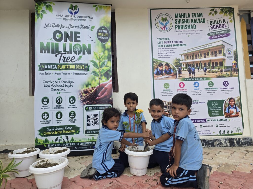 Students potting saplings in front of the One Million Trees banner