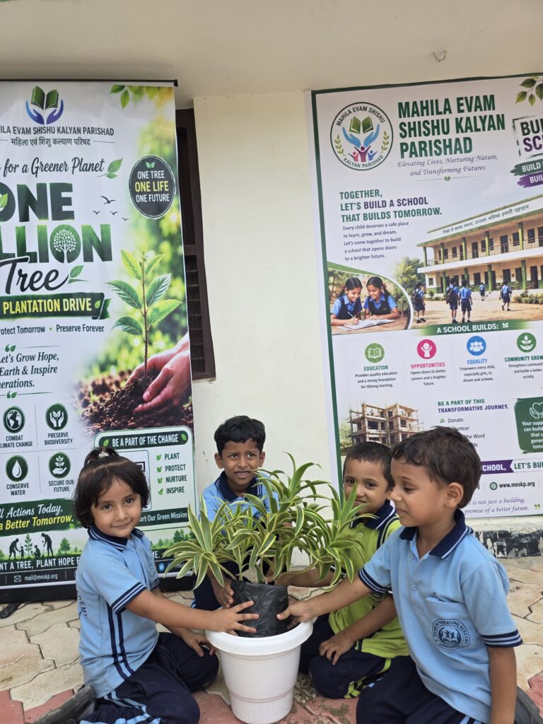 Students potting saplings in front of the One Million Trees banner