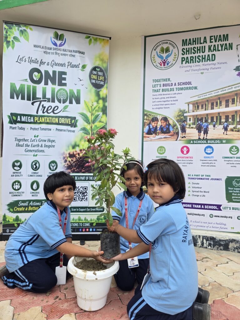 Students potting saplings in front of the One Million Trees banner