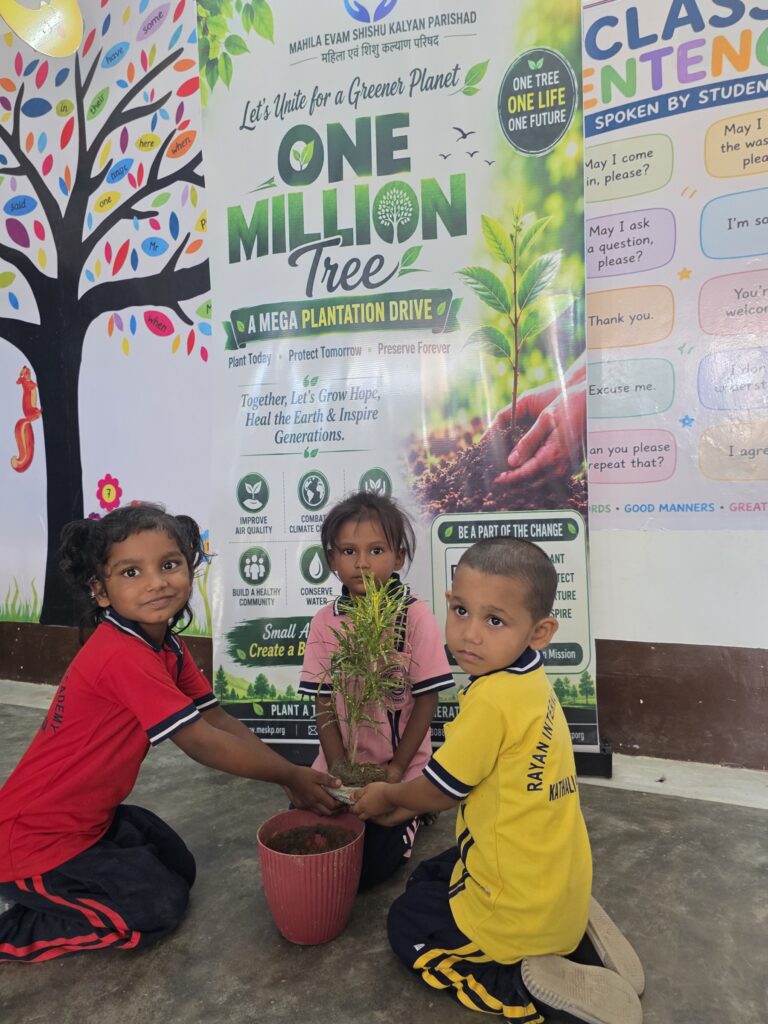 Students potting saplings in front of the One Million Trees banner