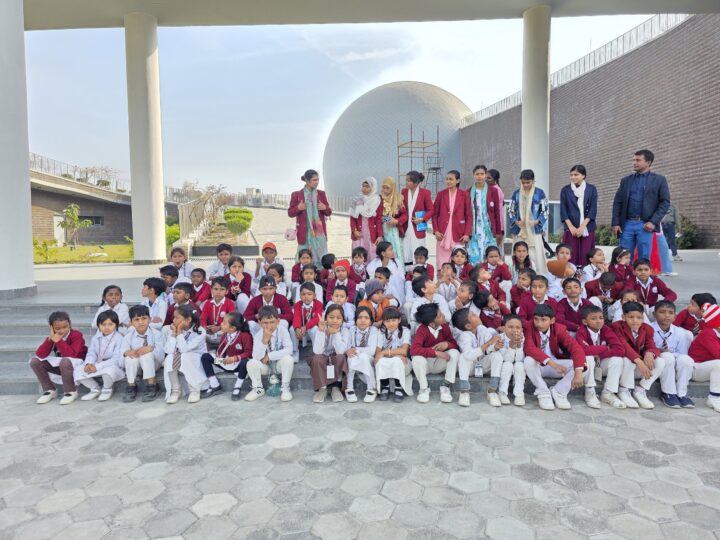 Students in front of the dome on the trip